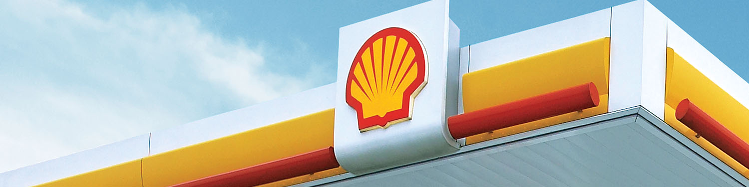 Foto von einer Shell Station mit blauem Himmel - Headerbild der Seite "Produkte"
