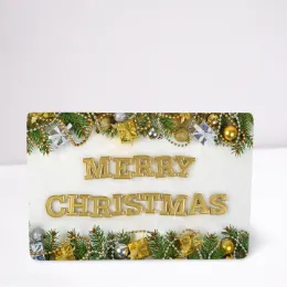 Verpackung mit dem goldenen Slogan "Merry Christmas"